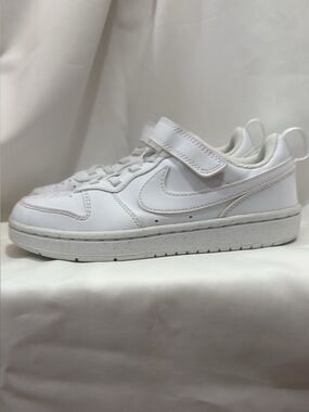 Boys white Nike sneakers